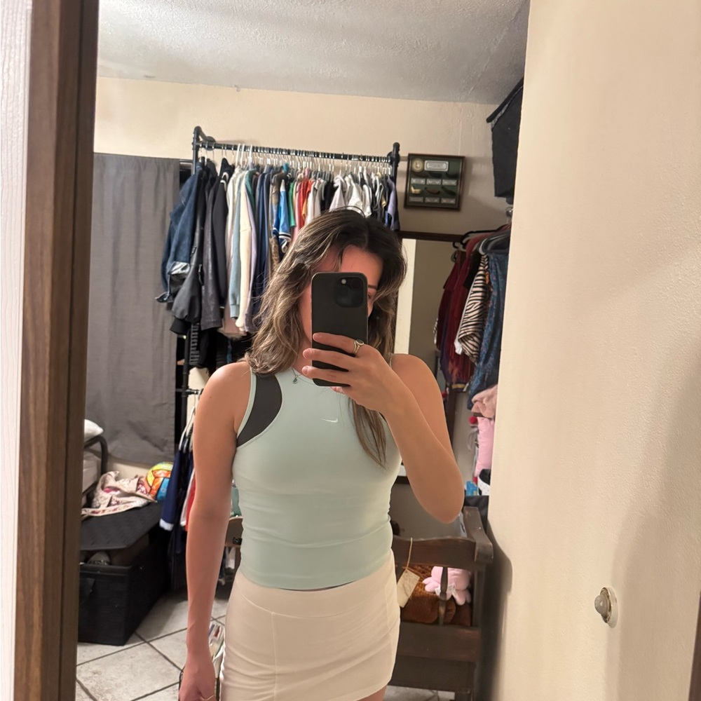 Women's light blue Nike runners top